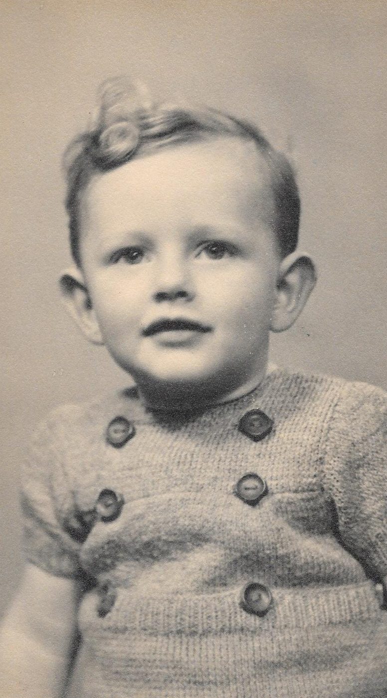 Studio portrait, as a toddler