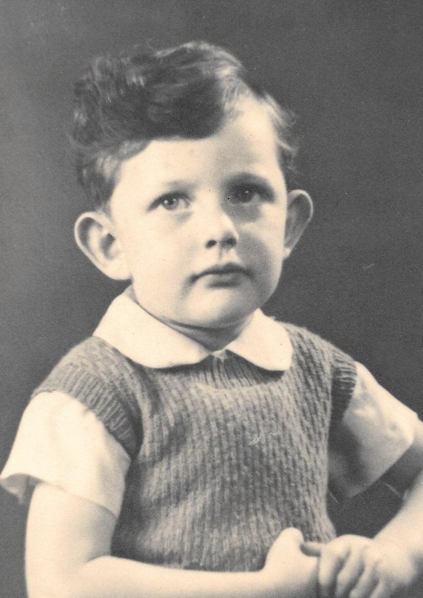 Studio portrait, as a young boy